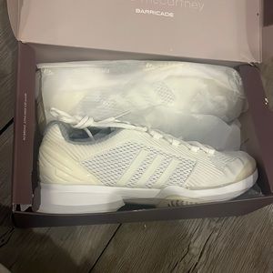 Never before used white Adidas stella McCartney aSMC barricade 2015 with tags.